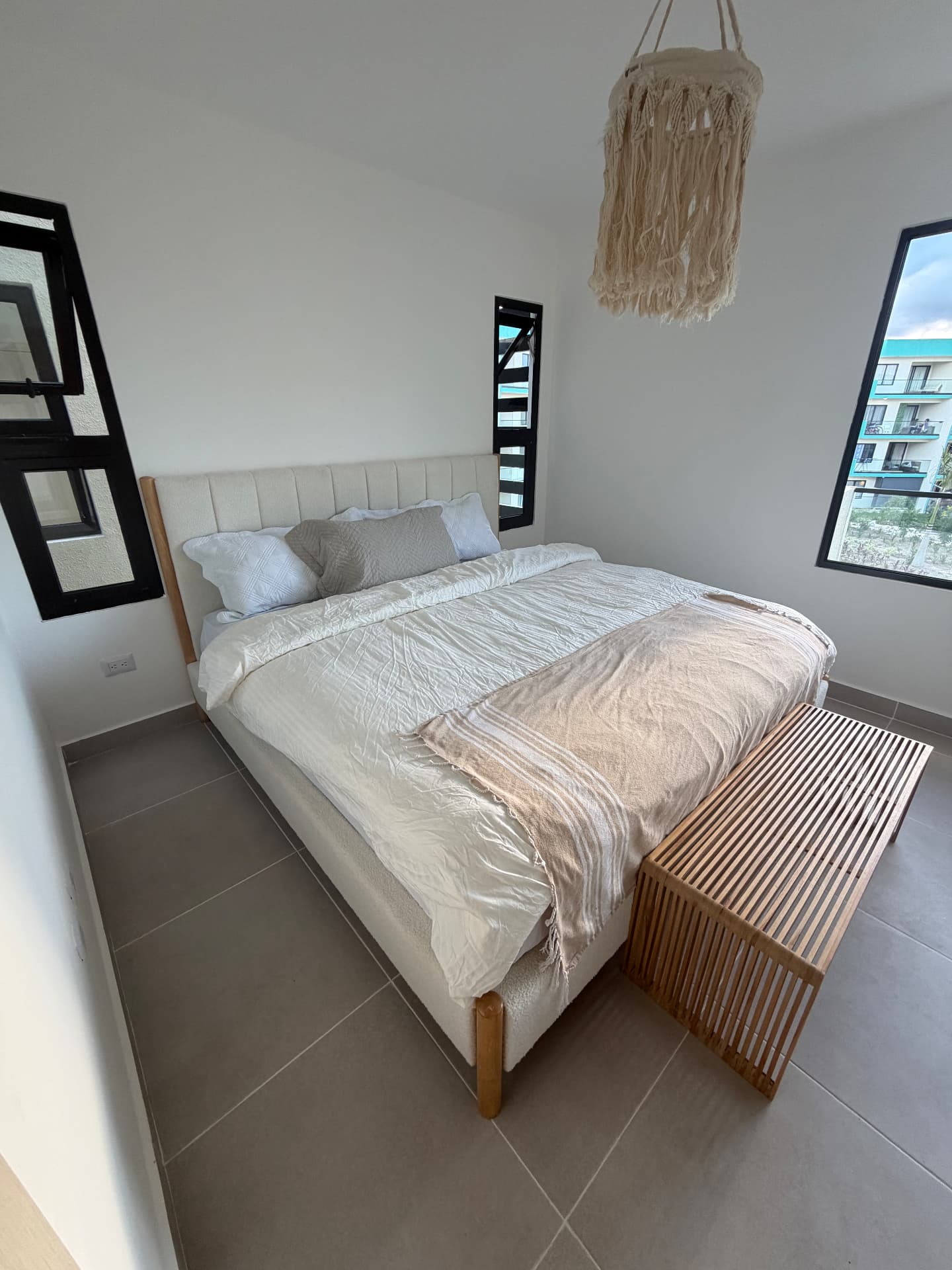 Pool outlook from the primary bedroom — Serena Village condo, Punta Cana