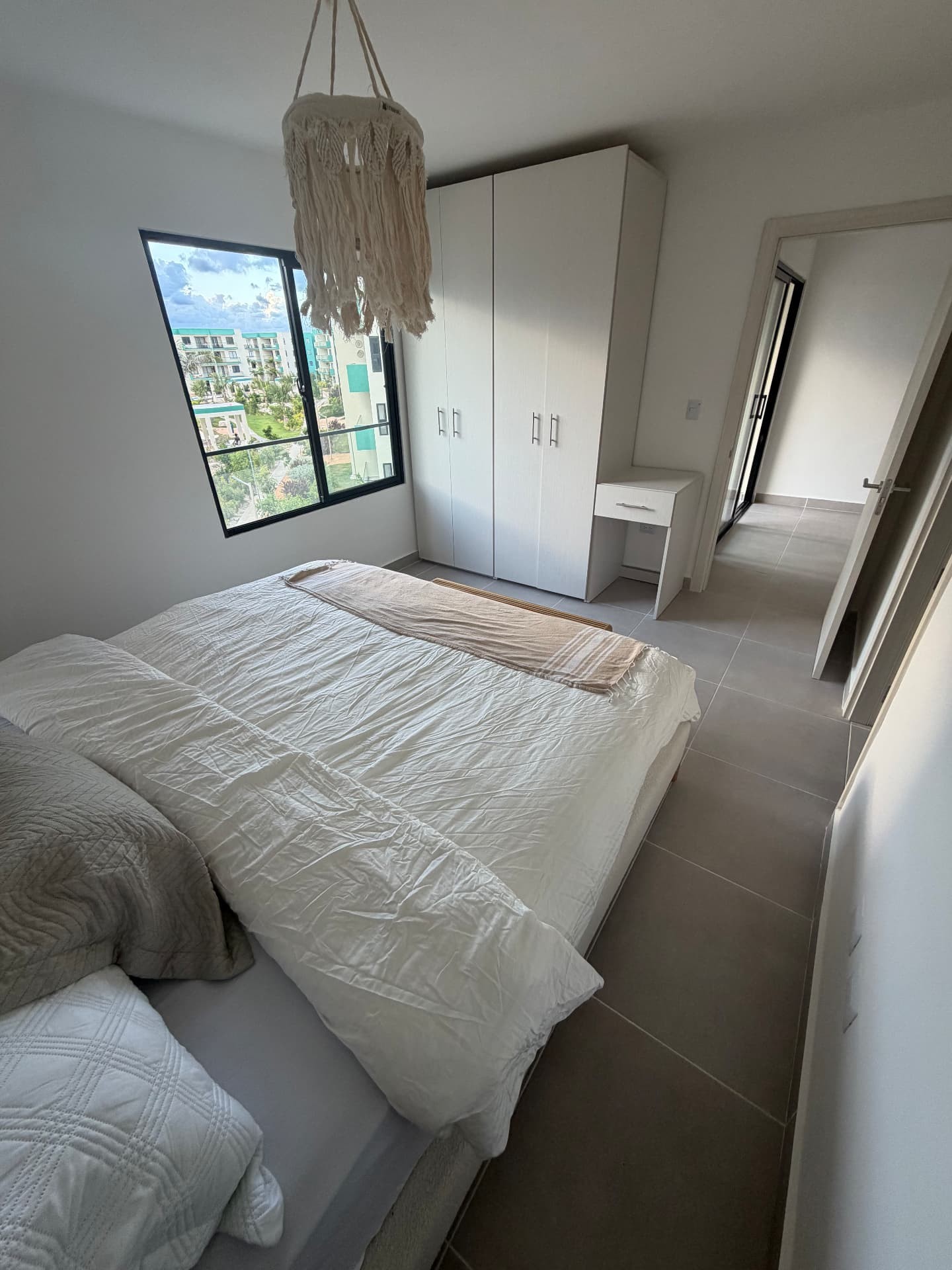 Primary bedroom — window & view — Serena Village condo, Punta Cana